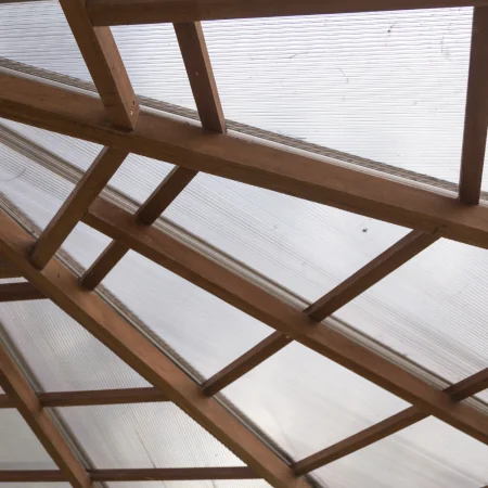 Polycarbonate roofing doesn’t require waterproofing maintenance to maintain integrity. The sheets allow light to pass through.